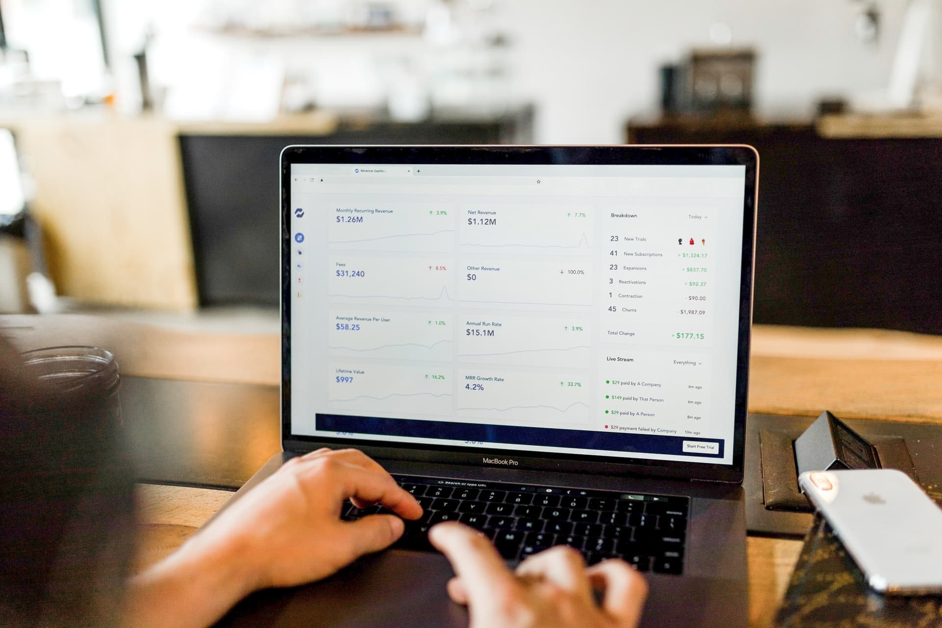 A person working on a laptop.